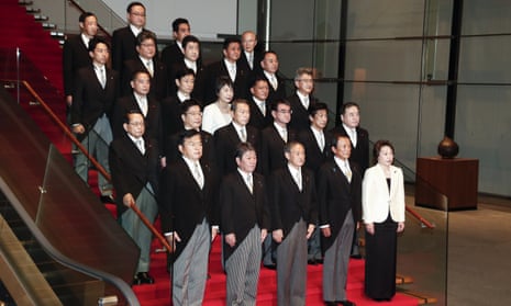 Japan’s new prime minister, Yoshihide Suga, (front row centre) poses for a photo with his cabinet members.