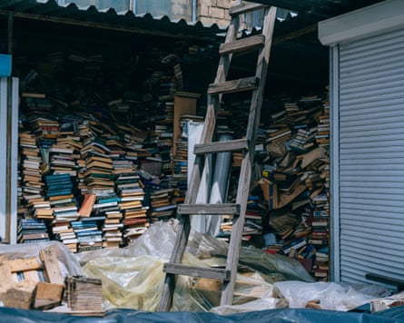 A warehouse filled with piles of books