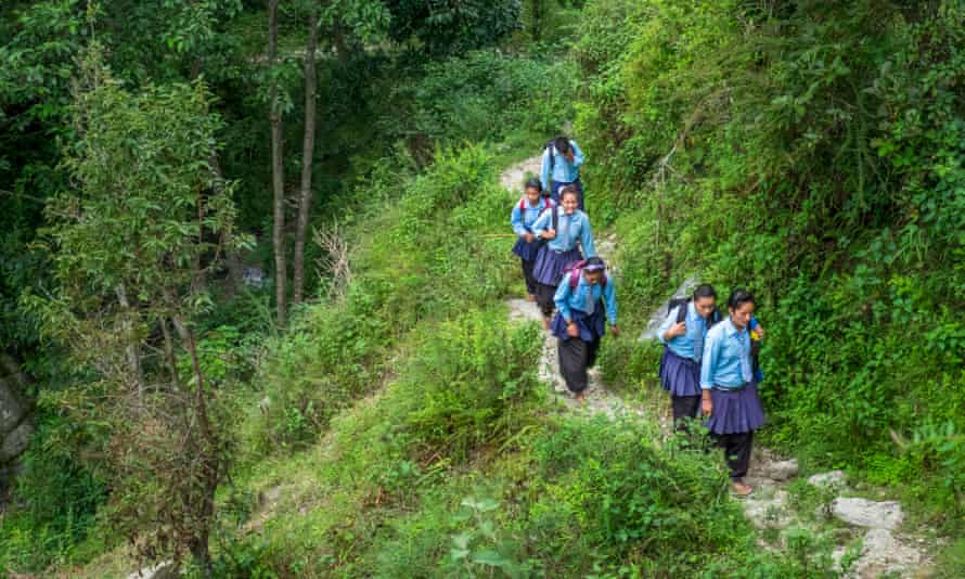 These schoolchildren from Surke must walk for about three miles each way to go to school