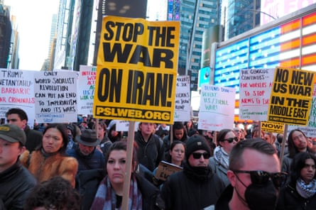 Person holds placard astatine protest
