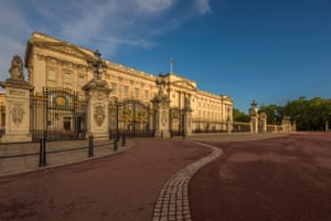 The flag flies over Buckingham palace with no sign of the crowds that will gather to see the majestic building and the Changing the Guard ceremony
