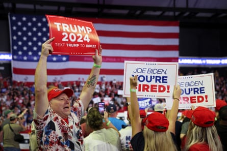 Supporters hold placards as Trump speaks in Philadelphia.