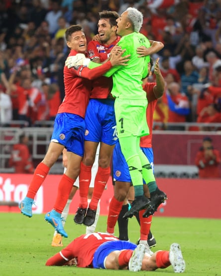 Keylor Navas and his Costa Rica teammates celebrate beating New Zealand to qualify for the 2022 World Cup