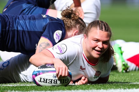 Sarah Bern smiles after touching down her second try and her team’s eighth