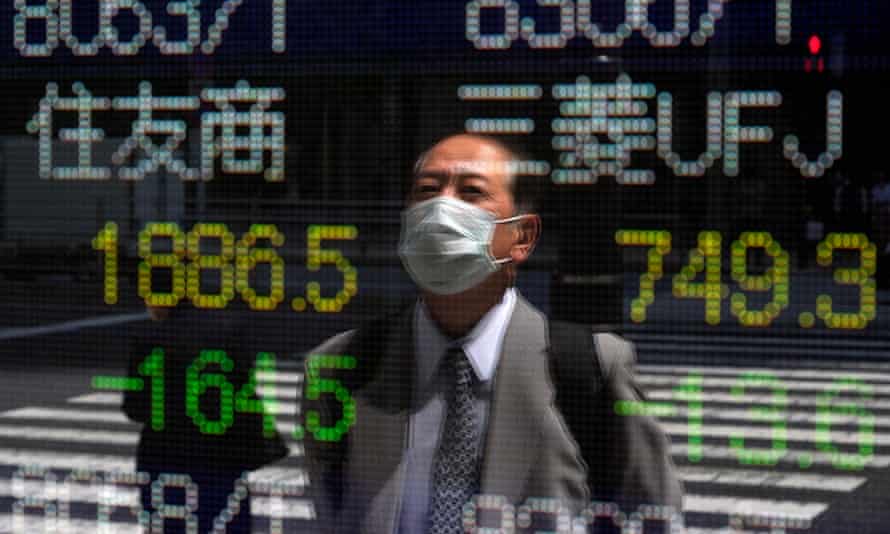 Tesco chairman requires energy windfall tax; Markets on edge after 'whatever thrashing'-- organization live|Organization 5 A stock market indicator board in Tokyo, Japan, today.