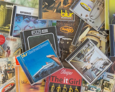 A pile of CDs showing some of the main groups behind the 90s Britpop movement, including Blur, Oasis, Space, Kula Shaker, Suede and Supergrass