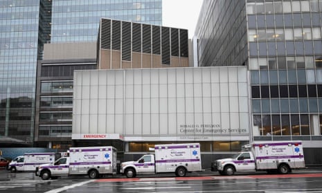 US-HEALTH-VIRUSAmbulances are parked in front of the NYU Langone Health Center hospital in New York City.