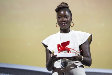 Alice Diop receives the Lion of the Future award for Saint Omer at the Venice film festival, September 2022.