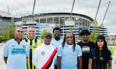 Members of City Matters, the official Manchester City fan network, including (third from right) . From left to right: Rodney Rhoden, David Southworth, Barrington Reeves, Hayden Jarrett, Andrew Bucknall, Don Grant, Reem Reynolds.