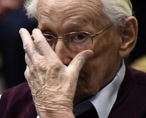 Oskar Gröning listens to the verdict at his trial in Lüneburg, Germany. He was convicted on 300,000 counts of accessory to murder and given a four-year sentence. 