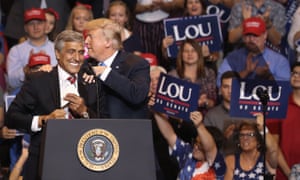 Senate candidate Lou Barletta gets a shoulder squeeze from President Donald Trump on August 2, 2018 in Wilkes-Barre, Pennsylvania.