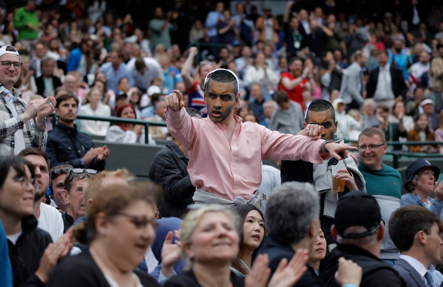 Tom Jenkins’ best shots of Wimbledon 2022 – in pictures | Wimbledon 2022 14 Fans of Nick Kyrgios applaud him during his match with Stefanos Tsistipas on Court One.