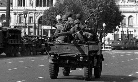 Army soldiers patrol the Buenos Aires Plaza de Mayo on March 24, 1976 after the military coup that overthrew President Peron.