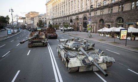 Russian tanks seized by Ukrainian forces are paraded in Kyiv.
