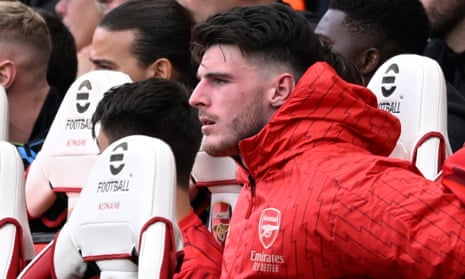 Declan Rice watches the north London derby from the bench on Sunday after being substituted at half-time with a back spasm