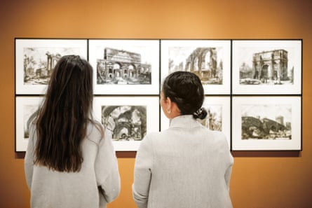 Two women in front of historical works of art, sharing their hobby