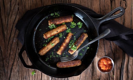 Vegan sausages in a frying pan