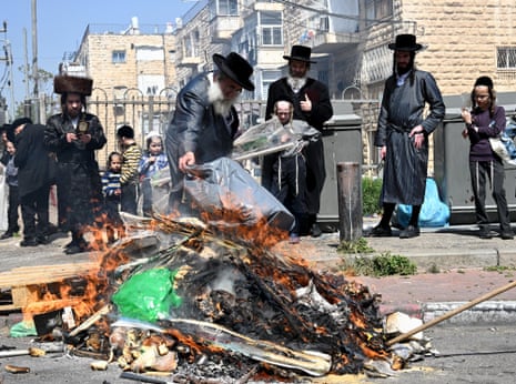 Ultra-Orthodox Jews burn leavened items before the start at sundown of the Jewish Passover holiday in Mea Shearim in Jerusalem.