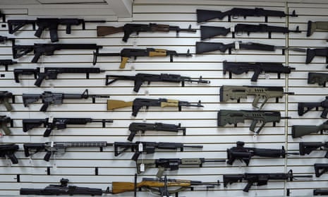 Semiautomatic rifles on a wall in a gun shop in Lynnwood, Washington on 7 November 2017.