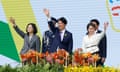 Taiwan's former President Tsai Ing-wen, new President Lai Ching-te and new Vice President Hsiao Bi-khim wave during the inauguration ceremony outside the Presidential office building in Taipei, Taiwan