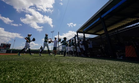 Players from Team Texas run to the dugout during the DYB Little League tournament in Ruston, Louisiana, on 9 August.
