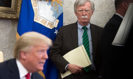 Former national security adviser John Bolton with President Trump at a Nato meeting in the White House in May 2018.