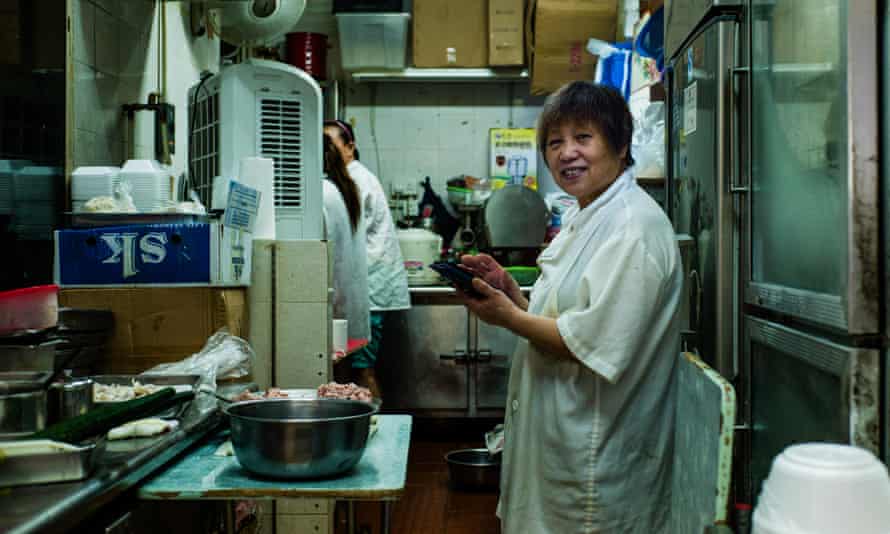 Zhang Zhenping, a dumpling stall owner originally from Tianjin, China, in her shop in Hong Kong.