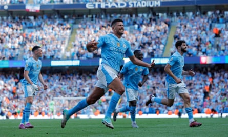Rodri wheels away in delight having scored to make it 3-1.