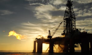 An oil rig in the ocean exploring for oil and gas.