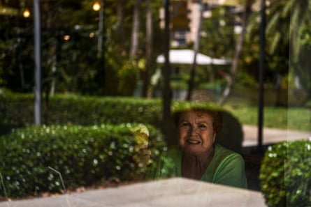 A woman eats ice cream inside a cafeteria at John Knox Village.