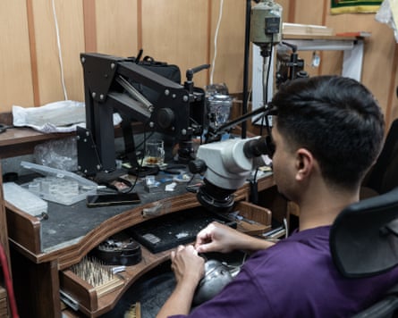 A man making jewellery