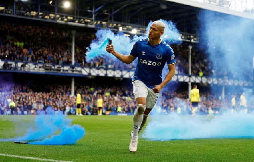 Everton’s Richarlison celebrates with a flare after scoring the only goal against Chelsea at Goodison Park.