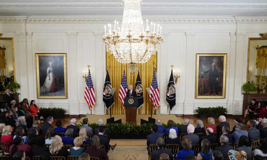 Joe Biden speaking at an event to celebrate the reauthorization of the Violence Against Women Act in the East Room of the White House.