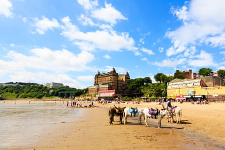 Donkey rides on the beach at Scarborough, North Yorkshire, England.