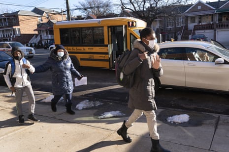 Students arrive at Meyer Levin Middle School, Thursday, on 25 February, 2021, in New York. In-school learning resumed for middle school students in New York City for the first time since the fall of 2020.