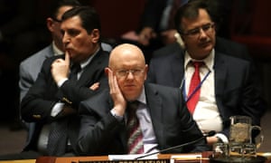 The Russian ambassador to the UN, Vassily Nebenzia, listens to the UK ambassador, Jonathan Allen.