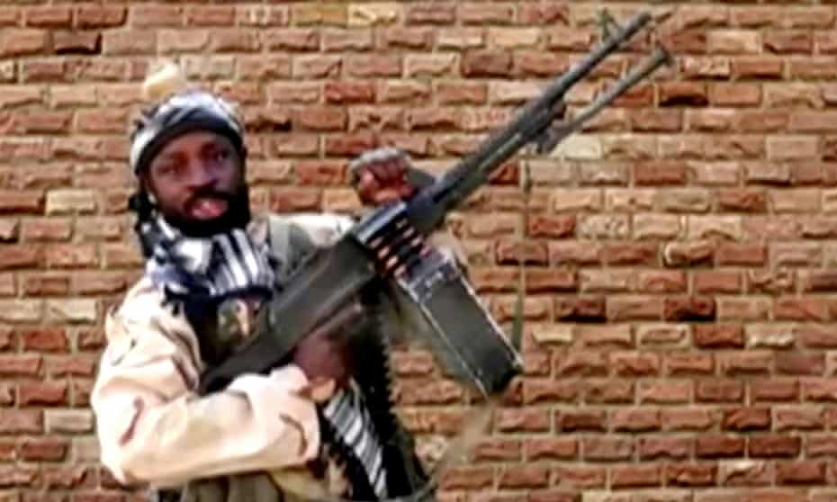The Boko Haram leader, Abubakar Shekau, holds a weapon in an unknown location in Nigeria a still image taken from an undated video obtained in January 2018