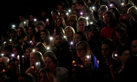 A moment of silence during a vigil for the victims.