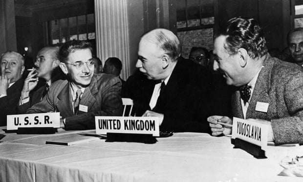 Keynes flanked by delegates from the USSR and Yugoslavia.