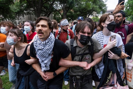 Demonstrators chant at a pro-Palestinian protest at the University of Texas.