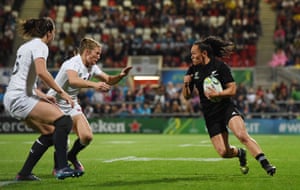 Lydia Thompson of England attempts to stop Portia Woodman of New Zealand during the Women’s Rugby World Cup 2017 Final between England and New Zealand