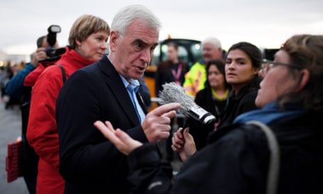 The shadow chancellor, John McDonnell, speaks to the media as he arrives ahead of Jeremy Corbyn’s address at the Labour Party conference