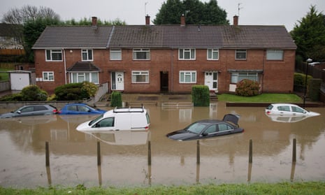Submerged cars are abandoned in Hartcliffe, Bristol, after Storm Angus