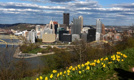 Daffodils grow on Mount Washington overlooking the skyline of downtown Pittsburgh. ‘This is a region that’s thriving and growing,’ says the head of a locally based not-for-profit organization.