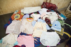 Zoenabo’s maternity bag: hats, socks, a change of clothes, trousers, pants, pieces of fabric, baby sling, basin, tumbler