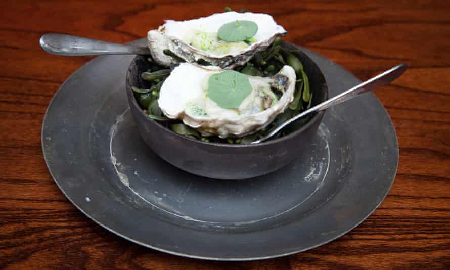 Oysters with nasturtium and beurre blanc dressing.