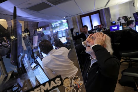 Traders at the New York Stock Exchange today.