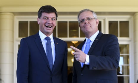 Australian Prime Minister Scott Morrison (right) poses for photographs with Australian Energy Minister Angus Taylor after a swearing-in ceremony at Government House in Canberra, August 28, 2018.