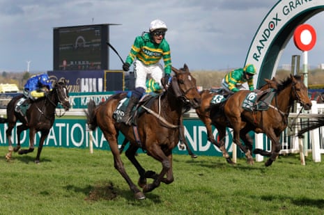 Paul Townend cheers as they cross the line