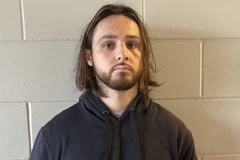 a man looking at a camera